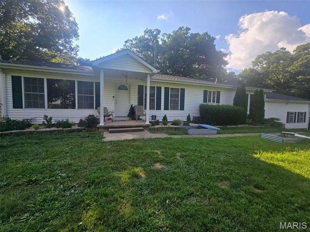 6.62 Acres of Land with Home for Sale in Vichy, Missouri