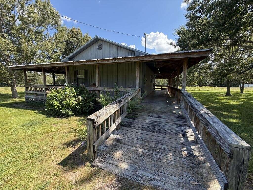 2 Acres of Land with Home for Sale in Opp, Alabama