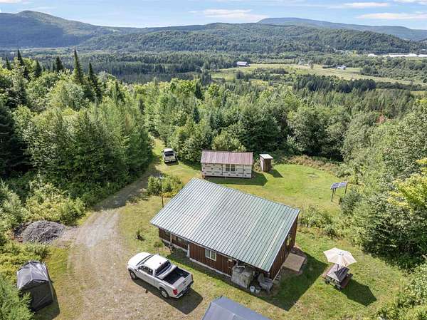 5.1 Acres of Land with Home for Sale in Pittsburg, New Hampshire