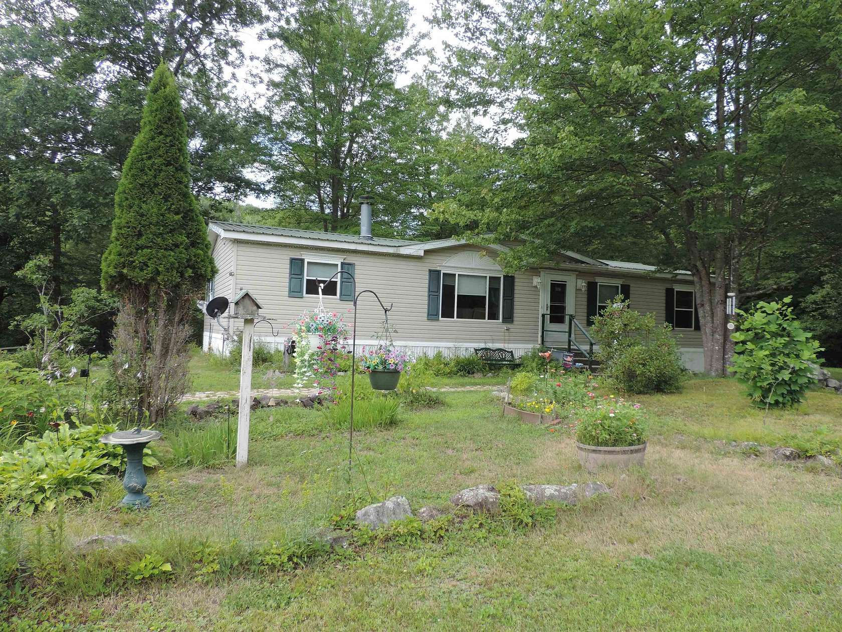 5.27 Acres of Land with Home for Sale in Deering, New Hampshire