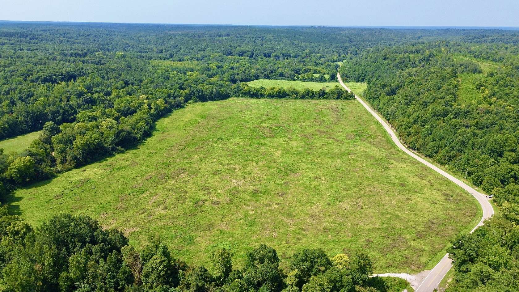 42.3 Acres of Land for Sale in Big Sandy, Tennessee