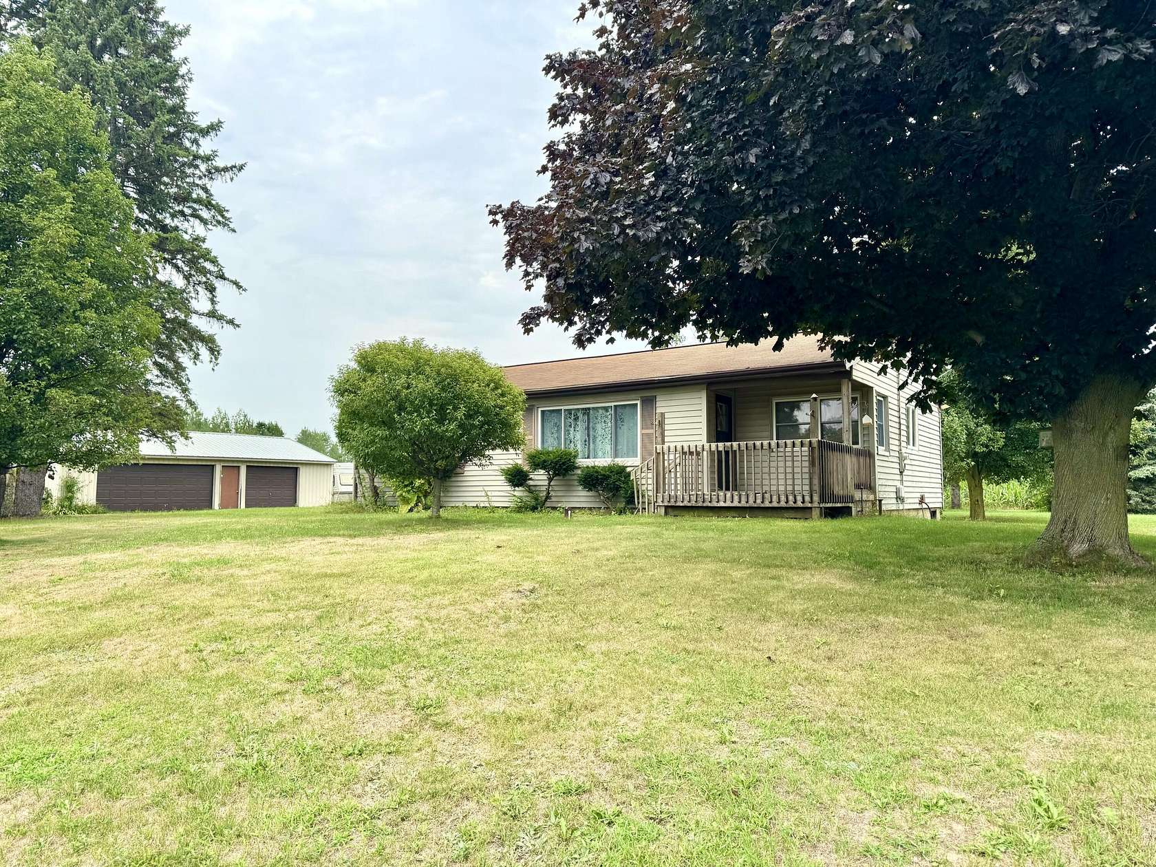 5.58 Acres of Land with Home for Sale in Rockford, Michigan