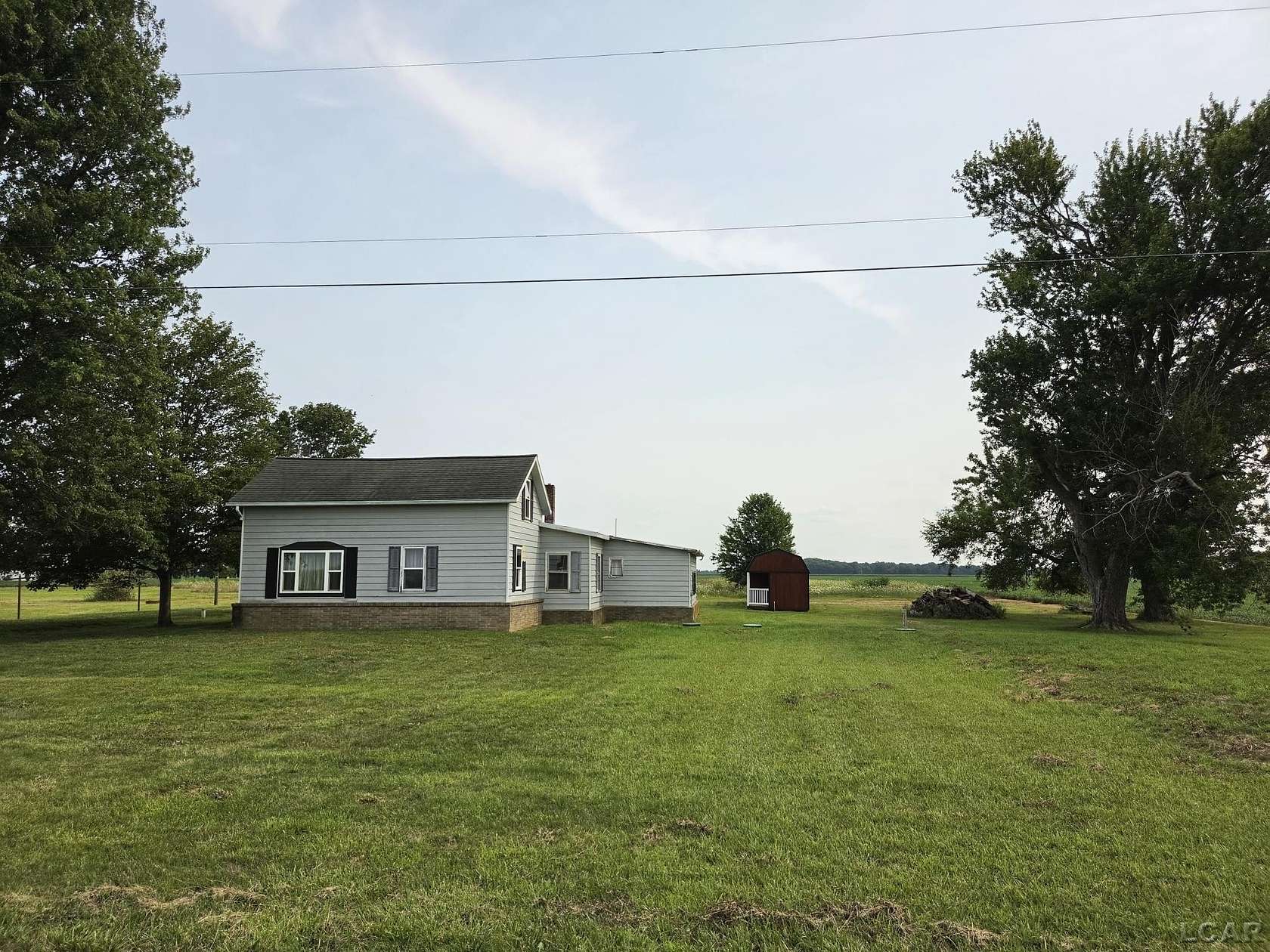 6 Acres of Land with Home for Sale in Jasper, Michigan