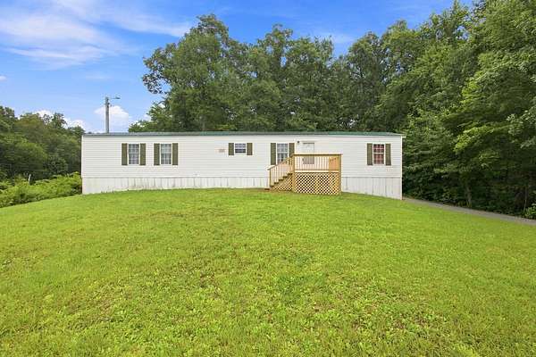 1.87 Acres of Land with Home for Sale in Pioneer, Tennessee
