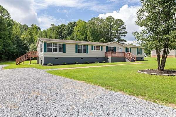 1.56 Acres of Land with Home for Sale in Skippers, Virginia