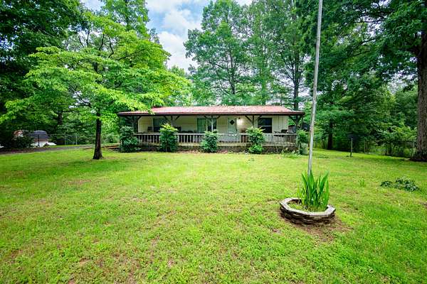 9.69 Acres of Land with Home for Sale in Lyles, Tennessee