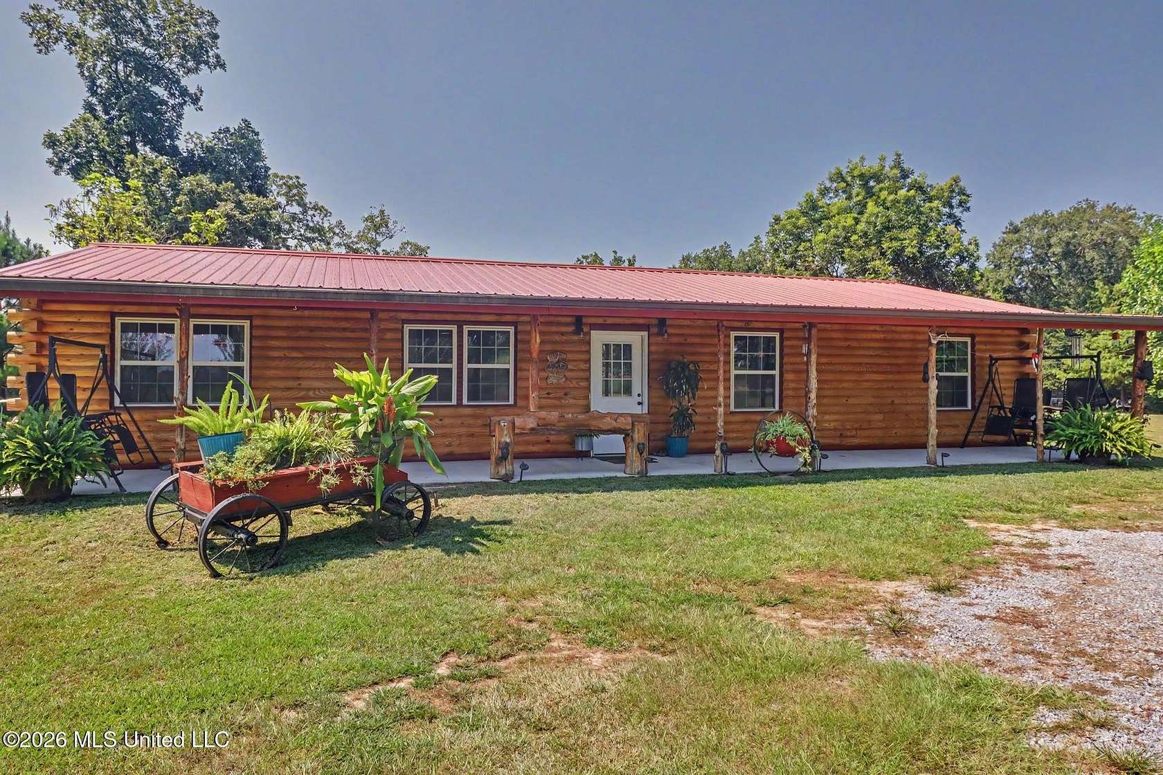 1.5 Acres of Land with Home for Sale in Wiggins, Mississippi