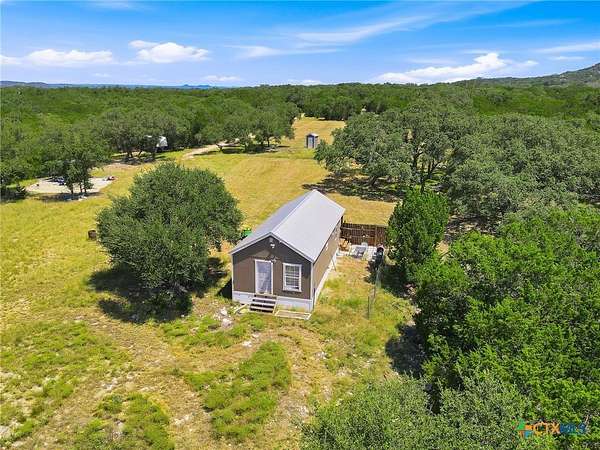 8.85 Acres of Land with Home for Sale in Lakehills, Texas