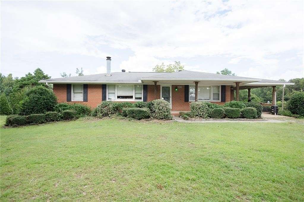 1.5 Acres of Land with Home for Sale in Opelika, Alabama