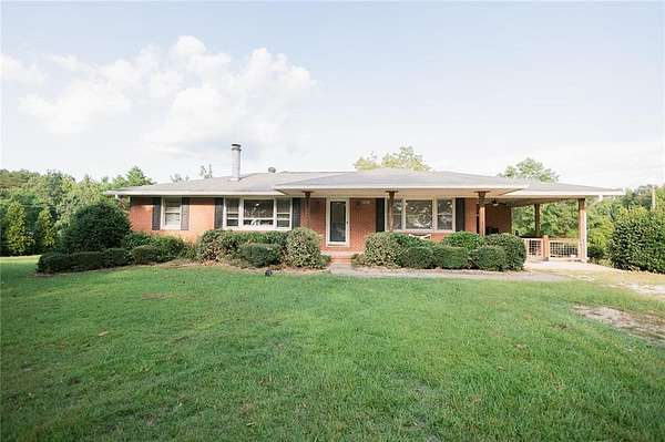 1.5 Acres of Land with Home for Sale in Opelika, Alabama