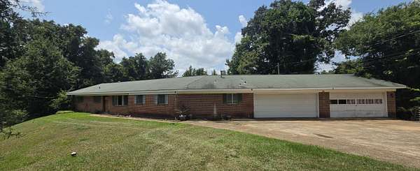 6.6 Acres of Land with Home for Sale in Tupelo, Mississippi