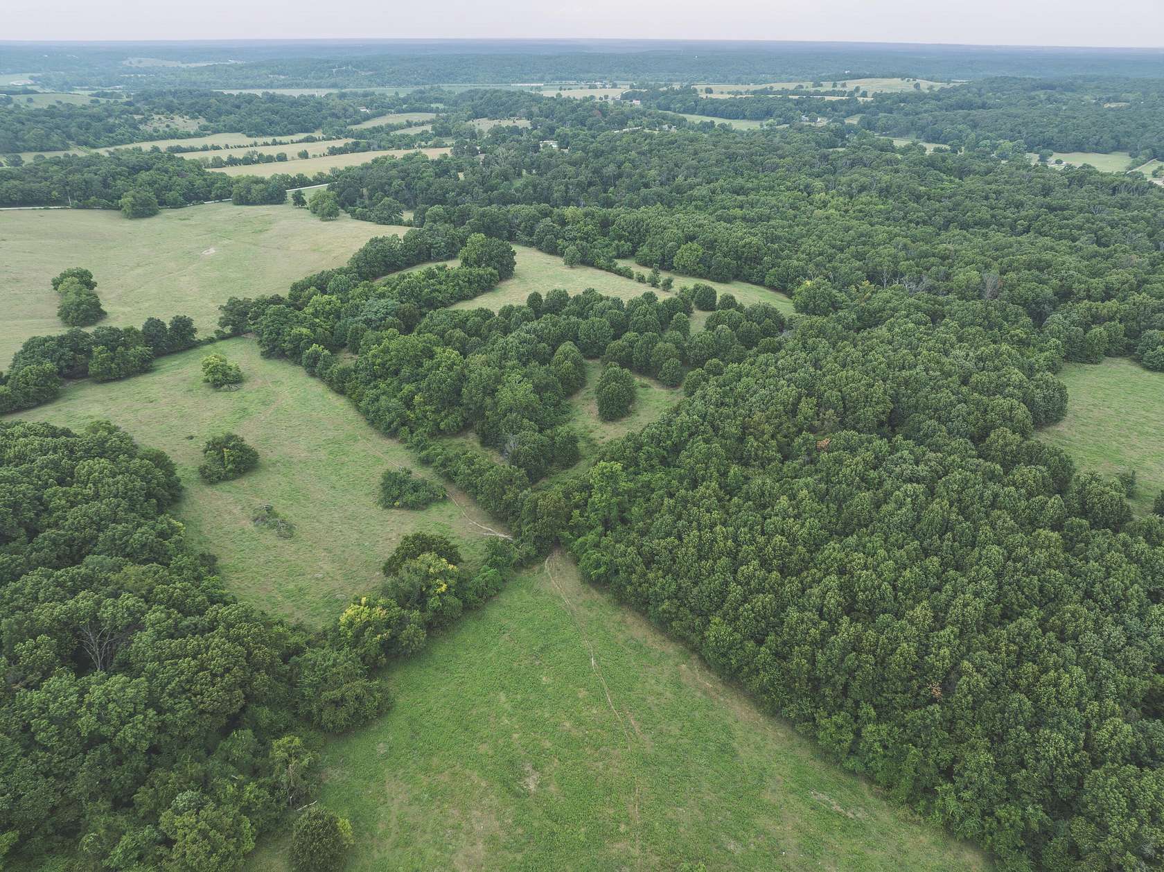 70.3 Acres of Land with Home for Sale in Neosho, Missouri