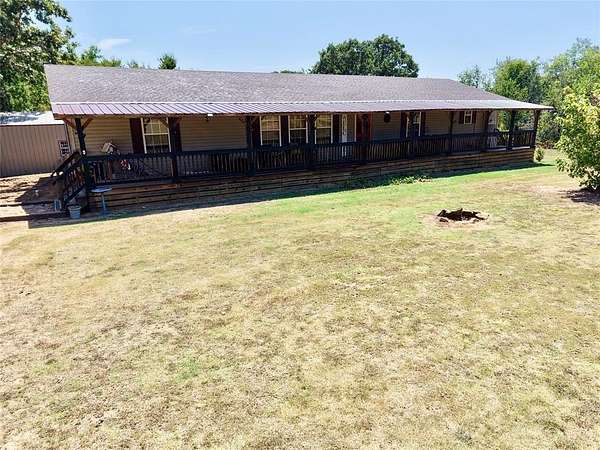 6.87 Acres of Land with Home for Sale in Okemah, Oklahoma