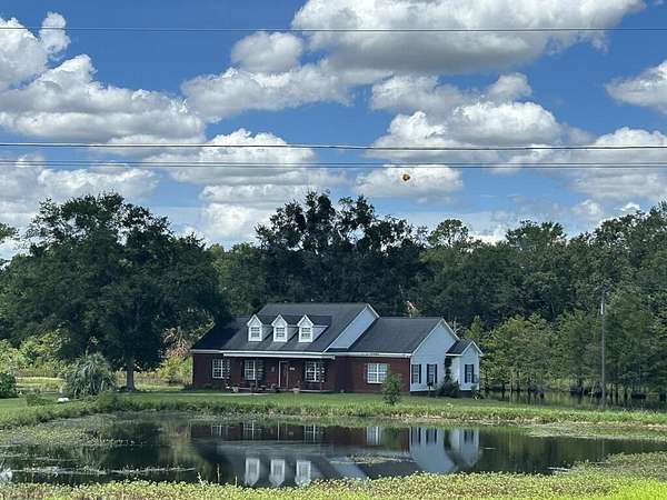 12.5 Acres of Recreational Land with Home for Sale in Cowarts, Alabama