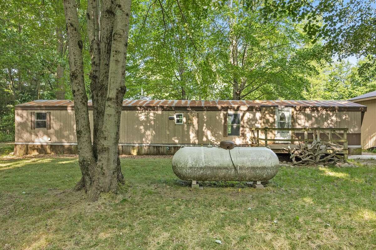 46.3 Acres of Land with Home for Sale in Morley, Michigan