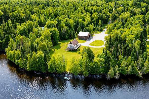 4.28 Acres of Land with Home for Sale in Rangeley, Maine