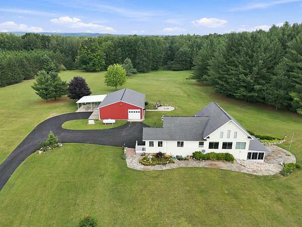 29.2 Acres of Recreational Land with Home for Sale in Gladwin, Michigan