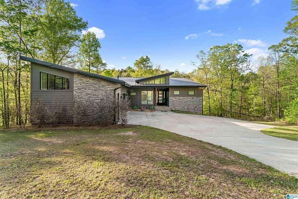 76 Acres of Land with Home for Sale in Dadeville, Alabama