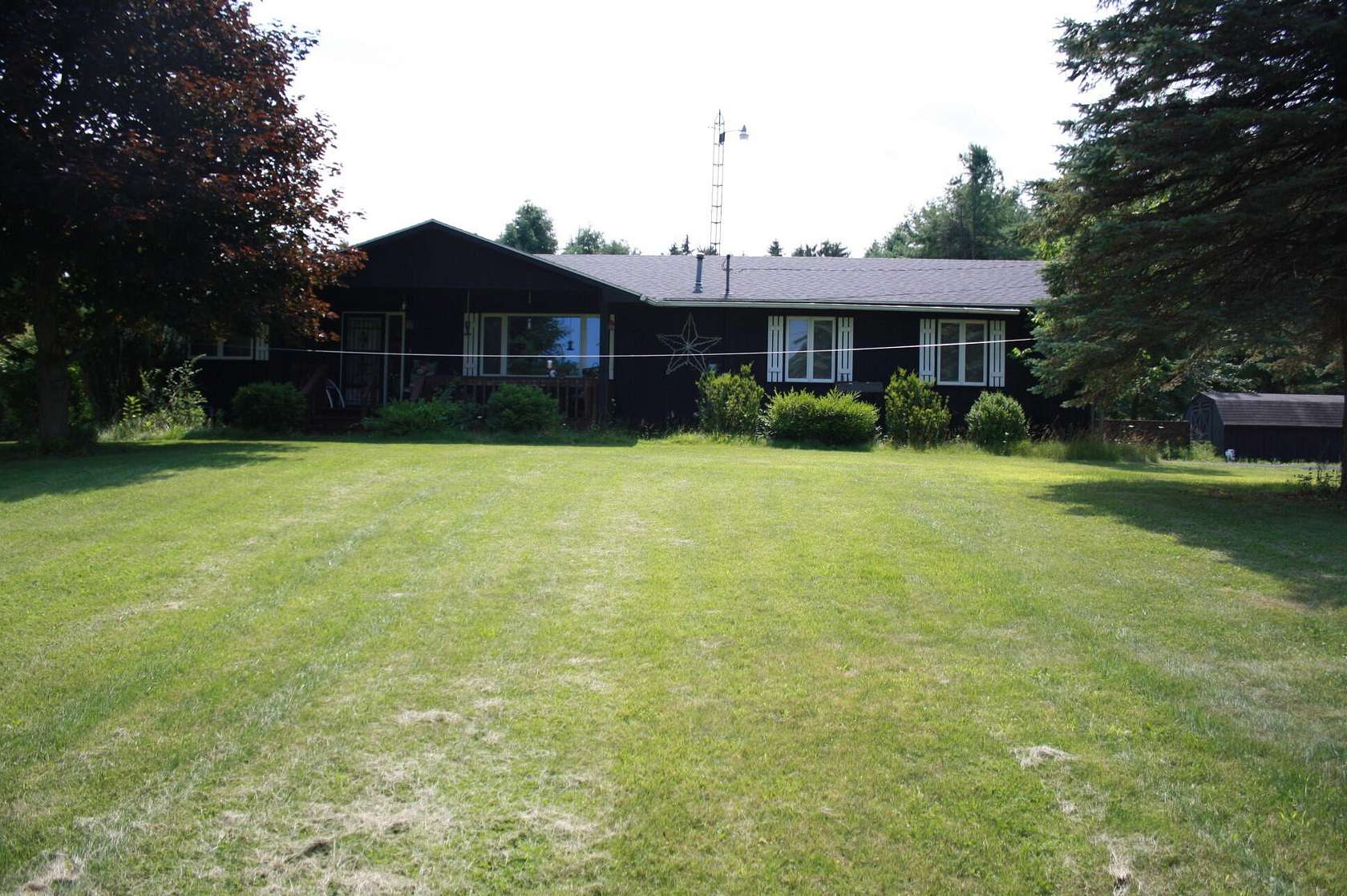 10 Acres of Land with Home for Sale in Harrisville, Michigan