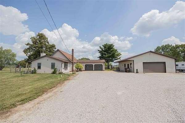 7 Acres of Land with Home for Sale in Exeter Township, Michigan