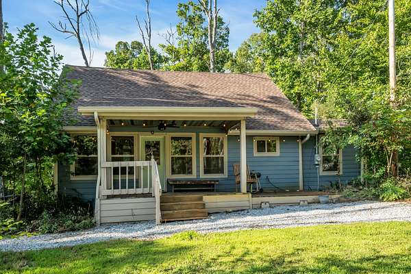 9.3 Acres of Land with Home for Sale in McEwen, Tennessee