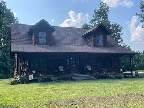 8.2 Acres of Land with Home for Sale in McEwen, Tennessee