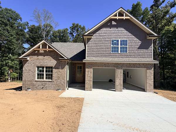 1.5 Acres of Land with Home for Sale in Cunningham, Tennessee