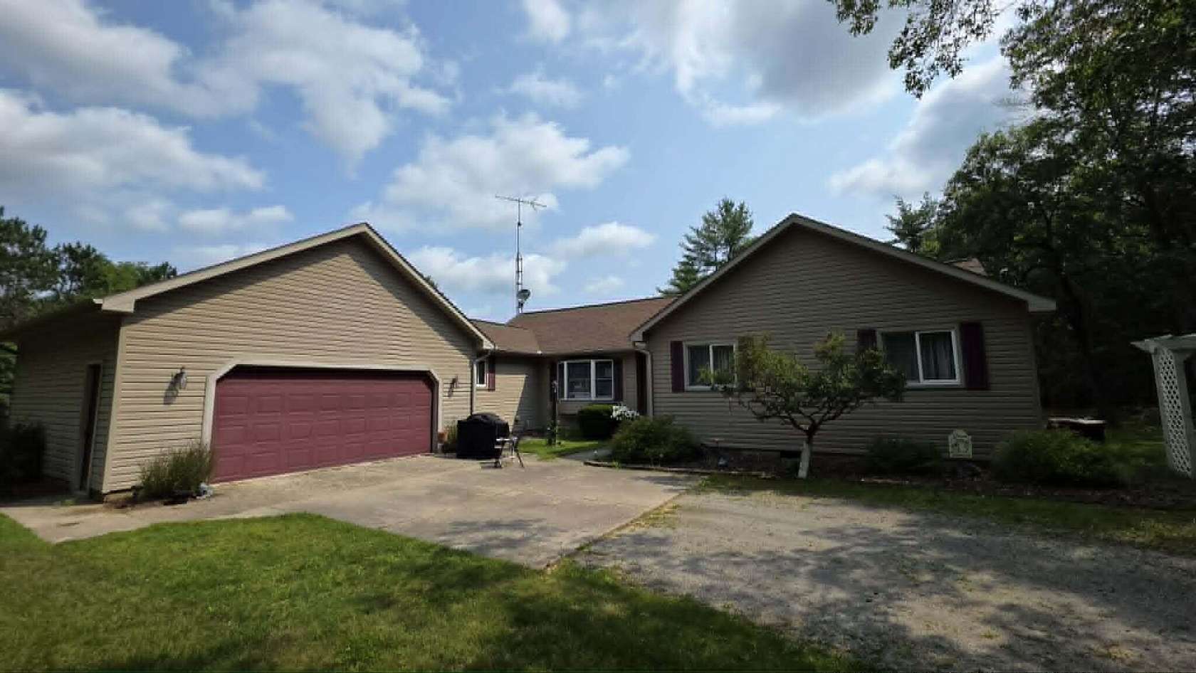 10 Acres of Land with Home for Sale in Harrisville, Michigan