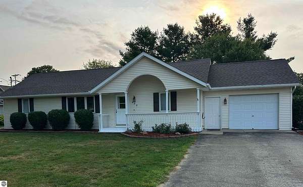 1.5 Acres of Land with Home for Sale in Shepherd, Michigan