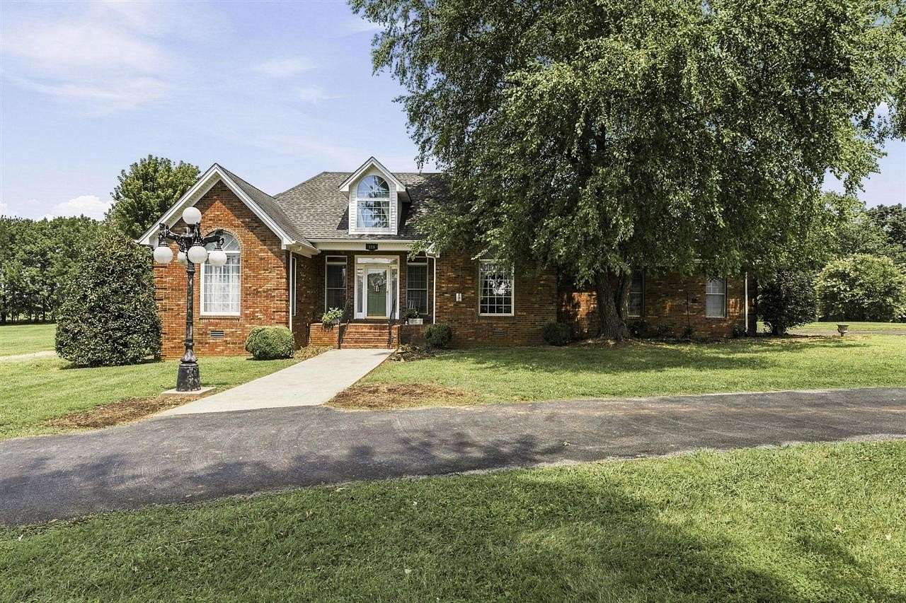 1.5 Acres of Land with Home for Sale in Smiths Grove, Kentucky