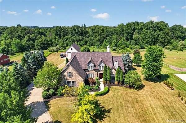 2.47 Acres of Land with Home for Sale in Marion Township, Michigan