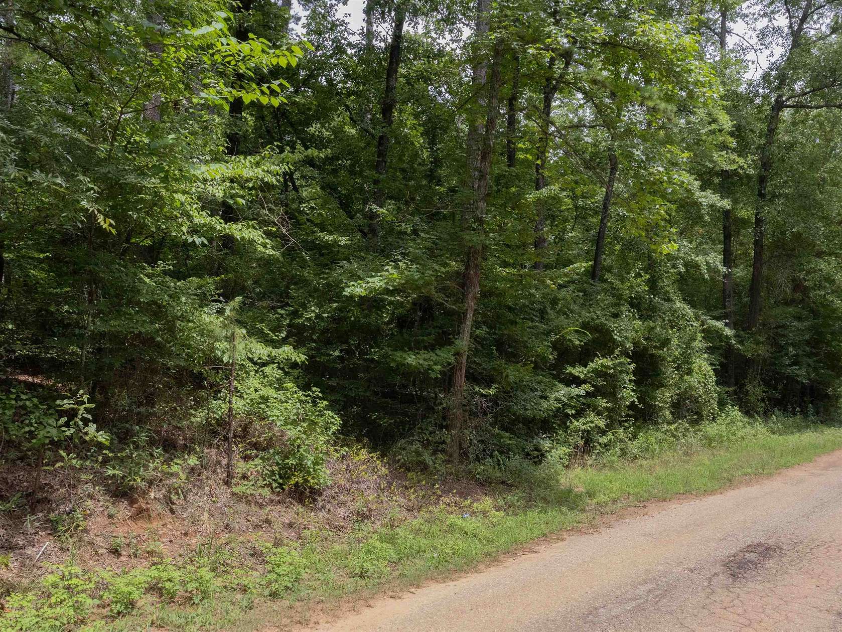 0.57 Acres of Residential Land for Sale in Ore City, Texas