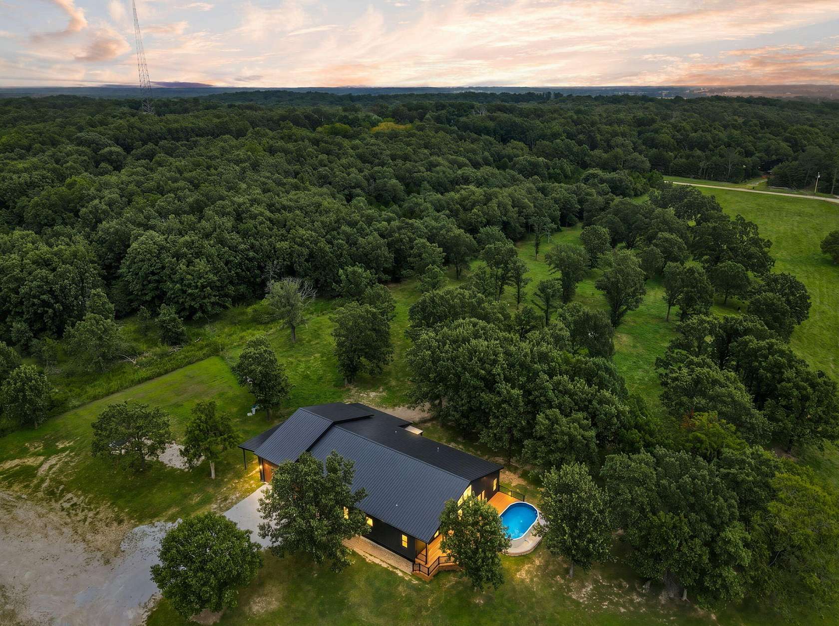92 Acres of Land with Home for Sale in Long Lane, Missouri