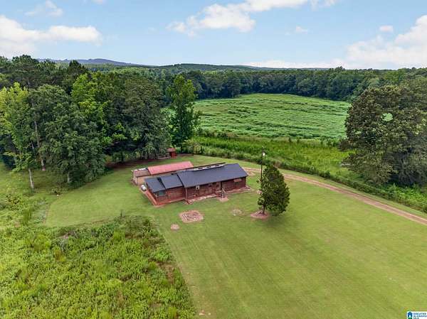 9.6 Acres of Land with Home for Sale in Heflin, Alabama
