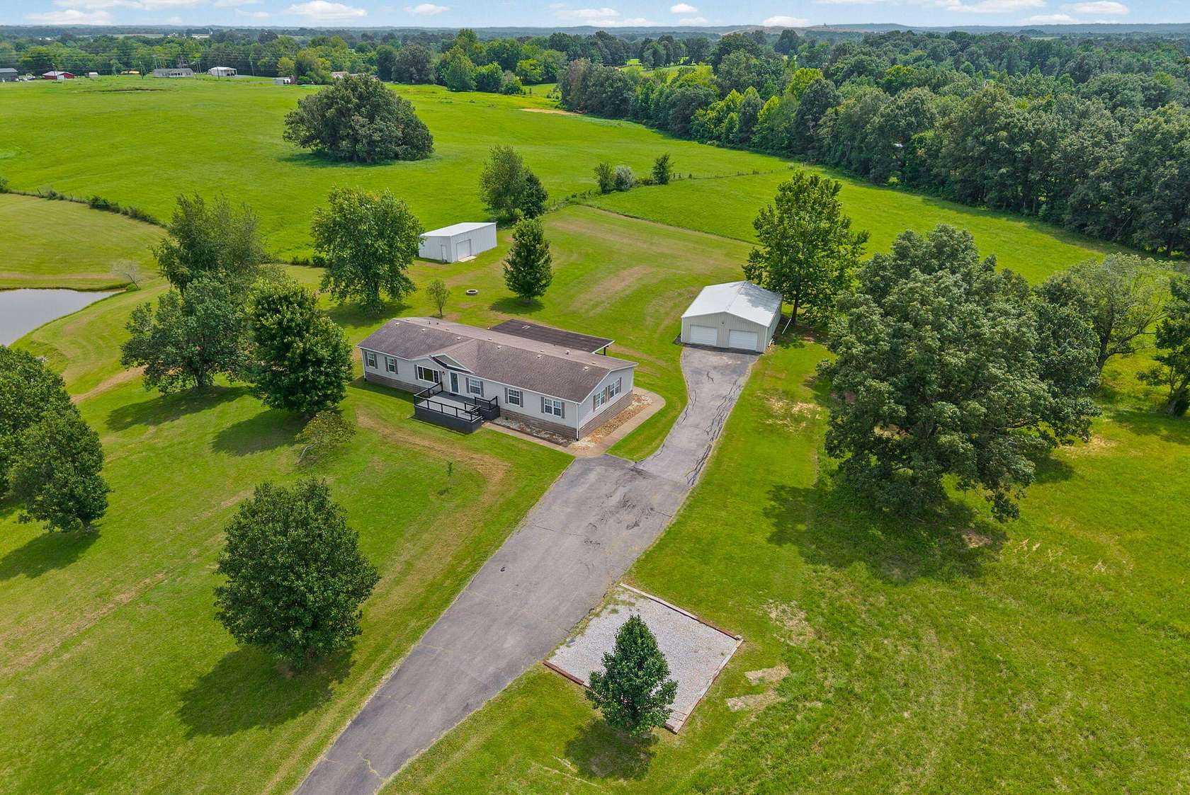 4.26 Acres of Land with Home for Sale in Nortonville, Kentucky