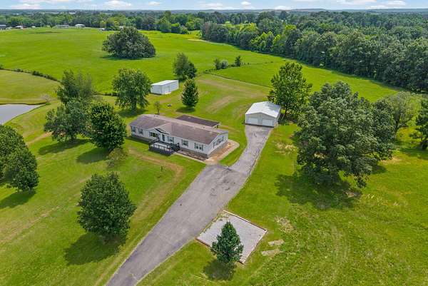 4.26 Acres of Land with Home for Sale in Nortonville, Kentucky