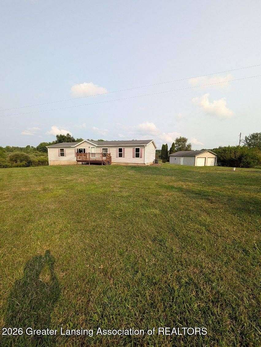 11.5 Acres of Land with Home for Sale in Charlotte, Michigan
