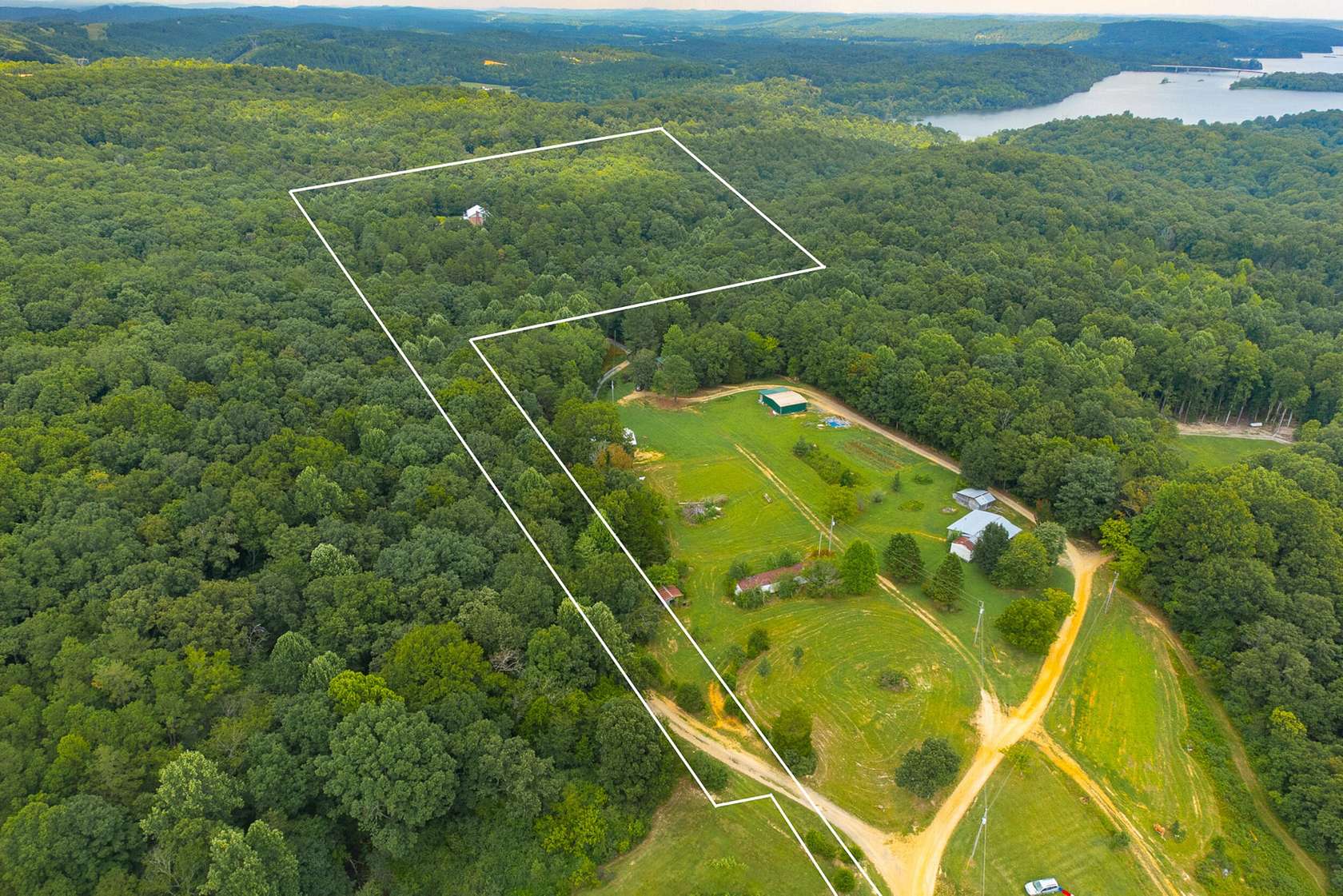17.9 Acres of Recreational Land with Home for Sale in Birchwood, Tennessee