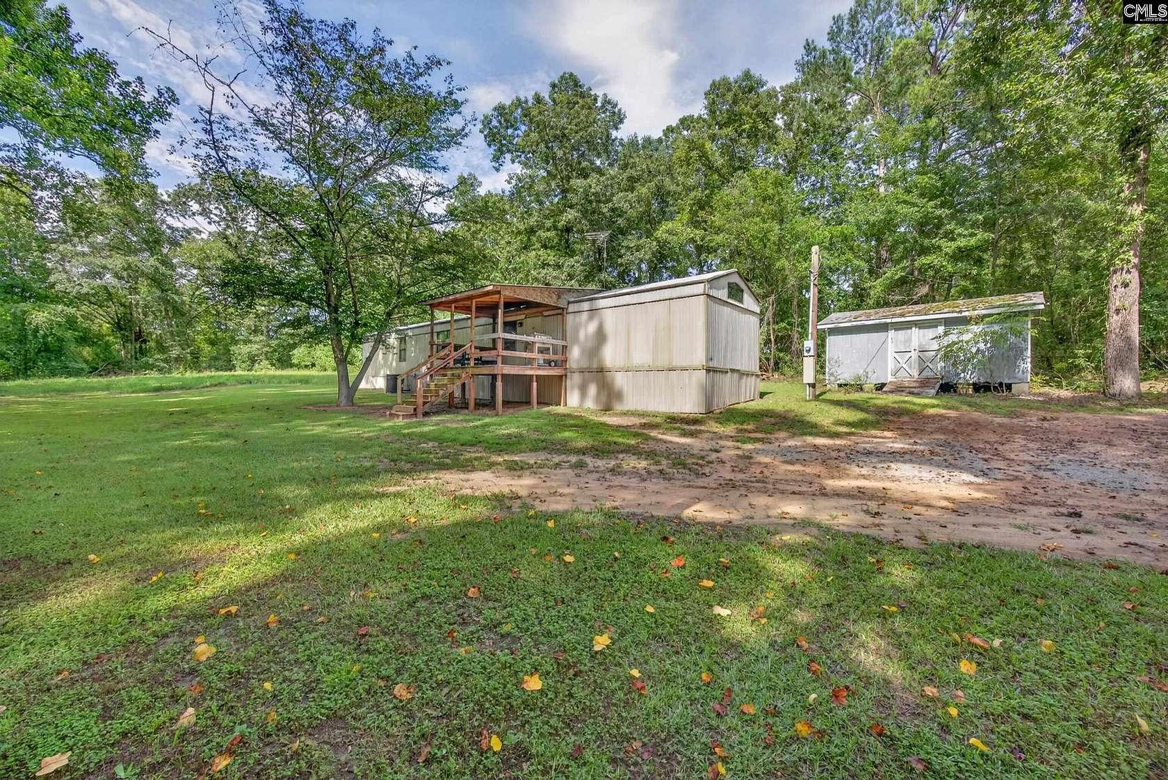 7.89 Acres of Land with Home for Sale in Swansea, South Carolina