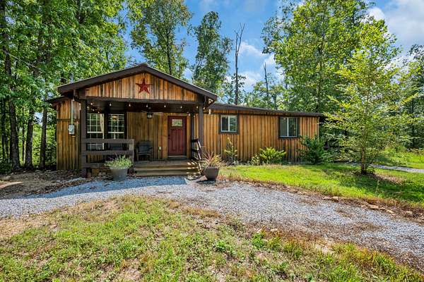 12.6 Acres of Land with Home for Sale in McEwen, Tennessee