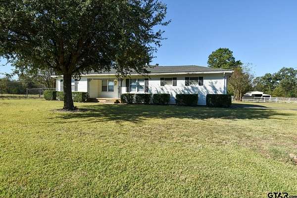 20.4 Acres of Agricultural Land with Home for Sale in Quitman, Texas