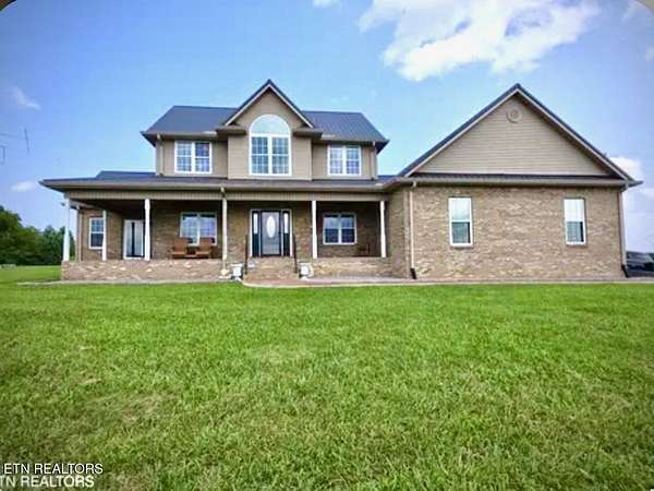 10 Acres of Land with Home for Sale in Harrogate, Tennessee