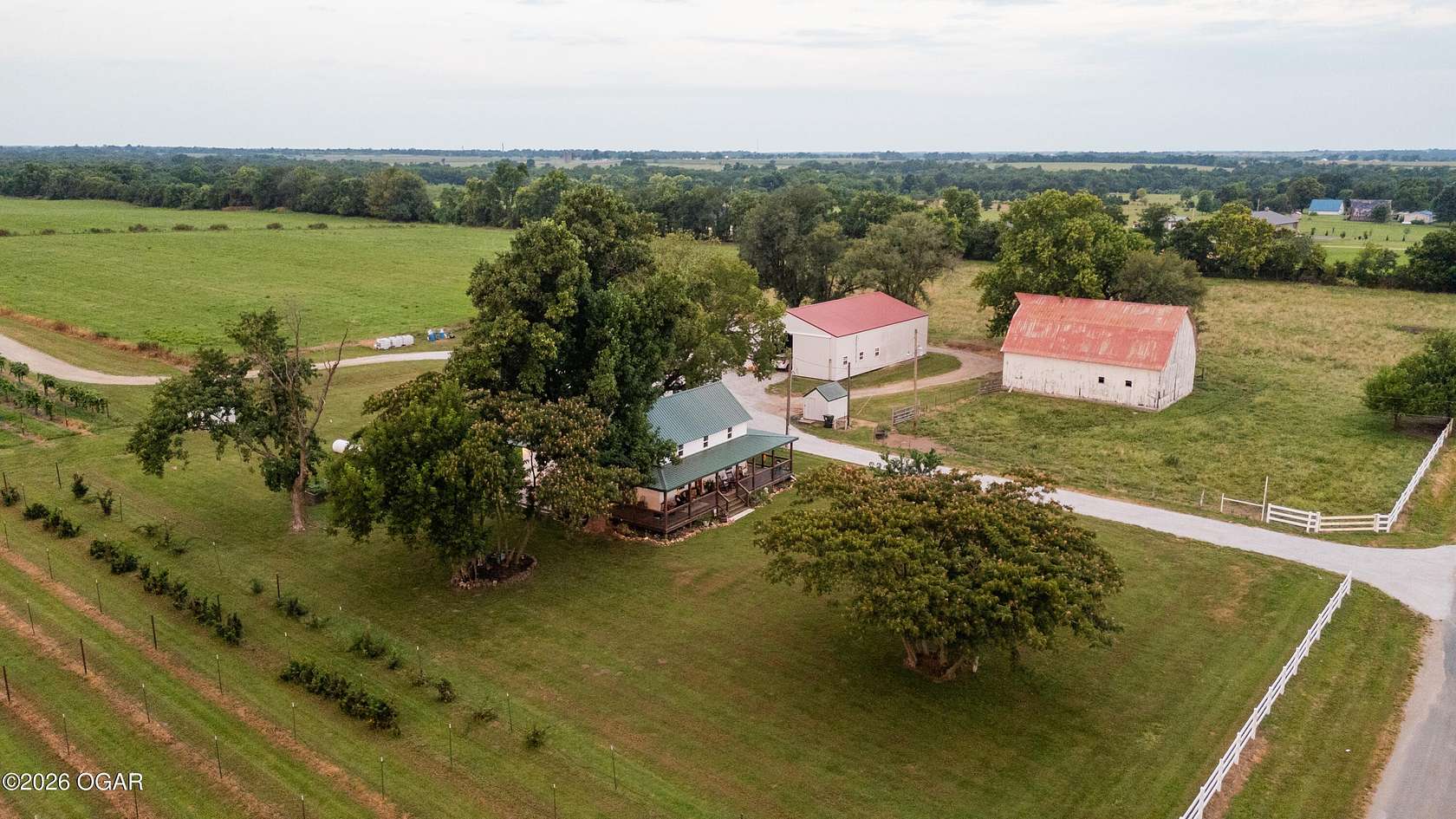 80 Acres of Agricultural Land with Home for Sale in Mount Vernon, Missouri