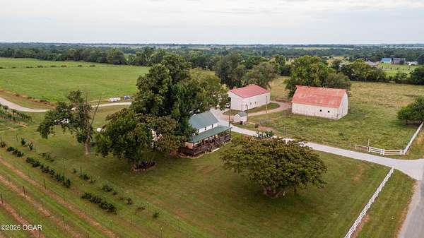 80 Acres of Agricultural Land with Home for Sale in Mount Vernon, Missouri