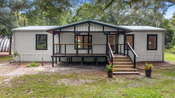 4.27 Acres of Land with Home for Sale in Old Town, Florida