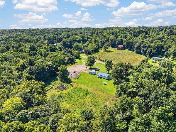 4.18 Acres of Land with Home for Auction in Crofton, Kentucky