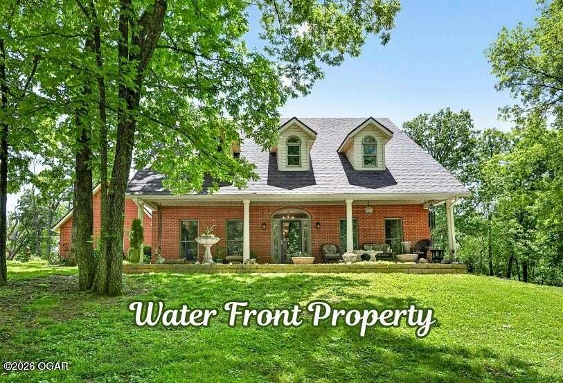 7 Acres of Land with Home for Sale in Carthage, Missouri
