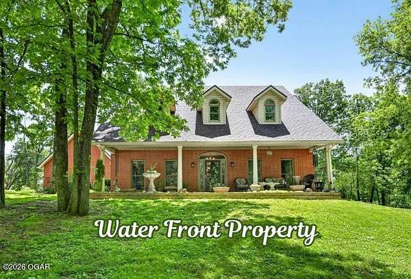 7 Acres of Land with Home for Sale in Carthage, Missouri