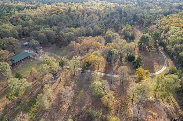 106 Acres of Recreational Land with Home for Sale in Winona, Texas