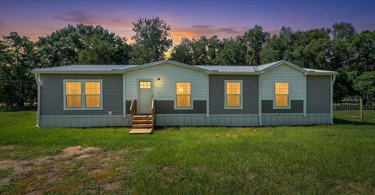 3 Acres of Land with Home for Sale in Weirsdale, Florida
